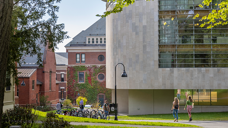 Clickable image of right side of Nielson Library with students and bikes